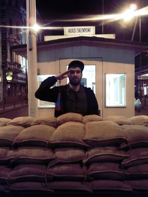 watching at Checkpoint Charlie by Markus Herrmann