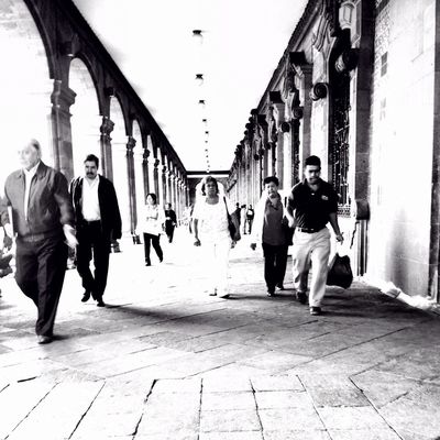 walking at Mexico City by Luis Mora