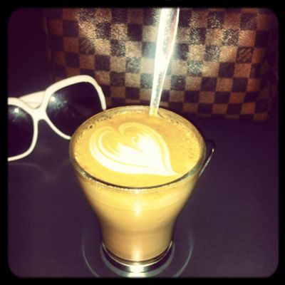 Drinking a Latte at Non Solo Bar by Ami Isavi