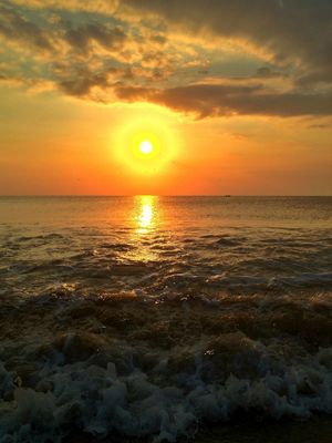 Enjoying the Sun at Jimbaran Beach by Nancy Subawa