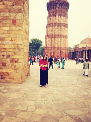 Hanging out at Alai Minar by Lily Van Tongeren