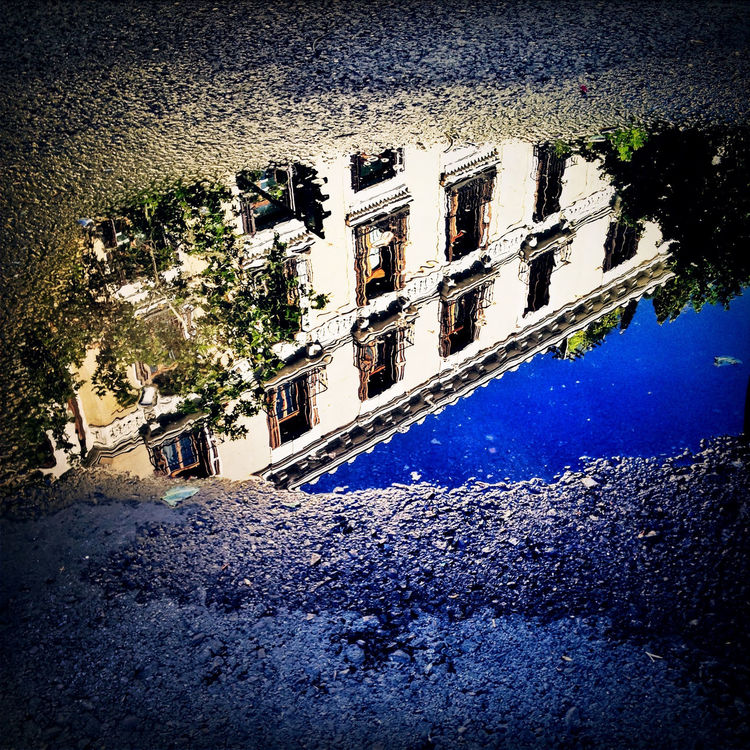 Reflection in Madrid by luison