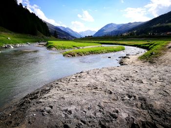 Scenic view of river against sky