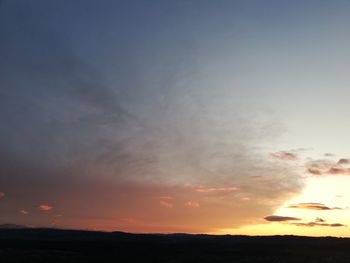 Low angle view of dramatic sky during sunset