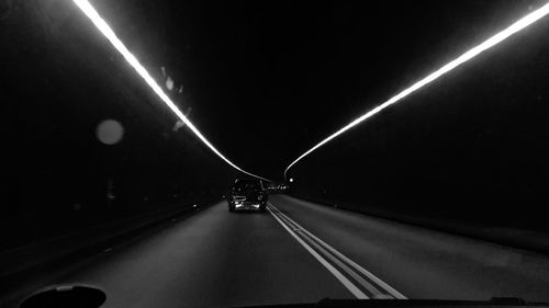 Light trails on road in tunnel