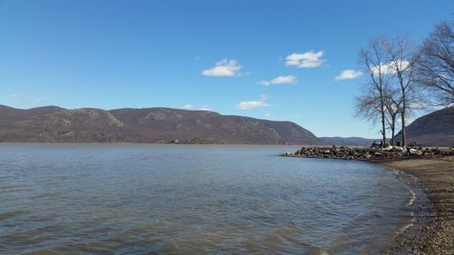 View of lake with mountain range in the background