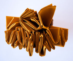 Low angle view of umbrellas against white background