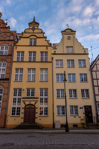 Low angle view of residential building against sky