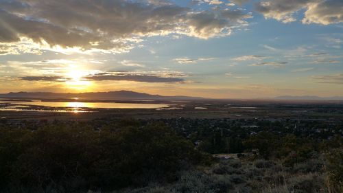 Scenic view of landscape against sky during sunset