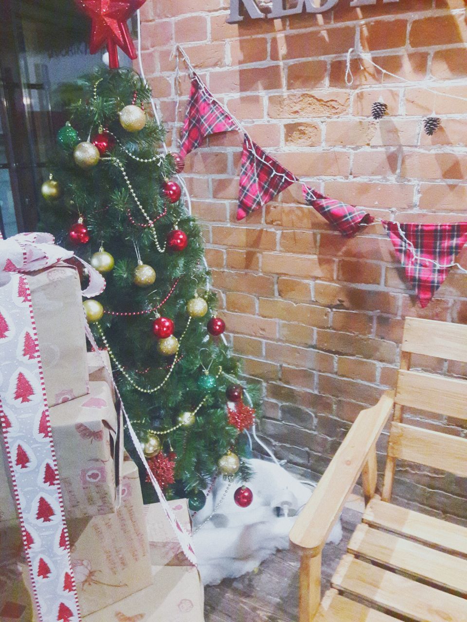 CLOSE-UP OF CHRISTMAS TREE ON WALL