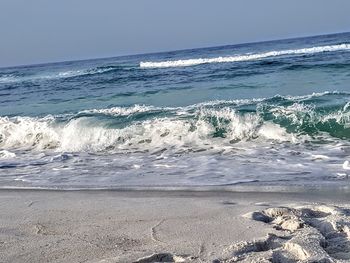 Scenic view of sea against clear sky