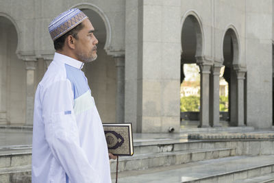 Man standing at mosque