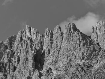 View of rocky mountains against sky