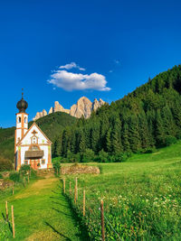 Church santa maddalena, val di funes, dolomites, italy, vertical photo, space for text