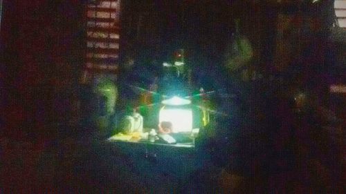 Blurred motion of people at night
