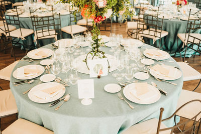 High angle view of glasses on table at restaurant