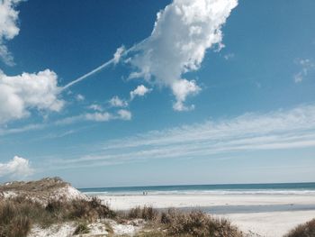 Scenic view of beach against sky