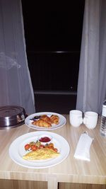 Close-up of breakfast served on table