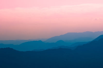 Scenic view of mountains at sunset