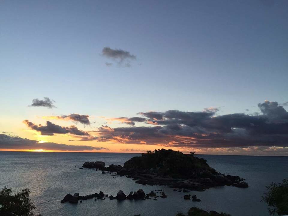 sea, horizon over water, water, tranquil scene, scenics, sunset, tranquility, sky, beauty in nature, nature, idyllic, rock - object, cloud - sky, orange color, outdoors, cloud, no people, dusk, coastline, beach