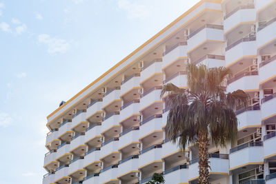 Identical semicircular balconies on the facade of a building in southern turkey. 