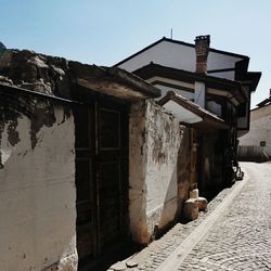 Abandoned building against clear sky