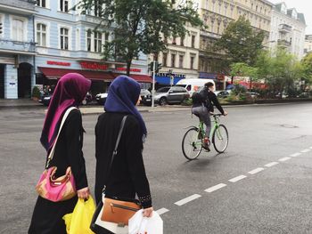 People walking on city street