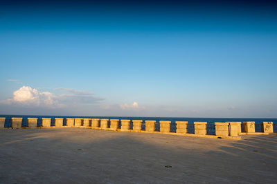 Scenic view of sea against blue sky