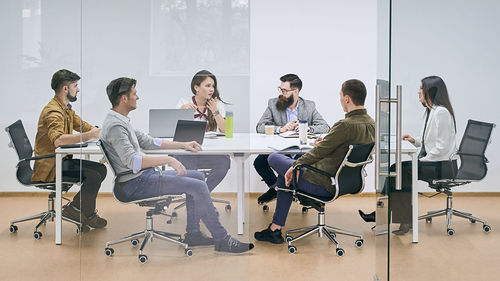 Business colleagues working at gym
