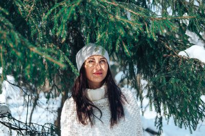 Portrait of young woman in winter