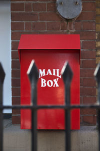 Close-up of sign on wall