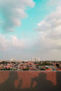 Buildings against sky in city