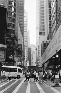 People crossing city street