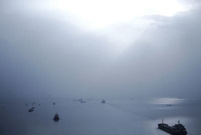 Scenic view of sea against sky during winter