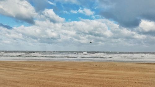 Scenic view of beach against sky