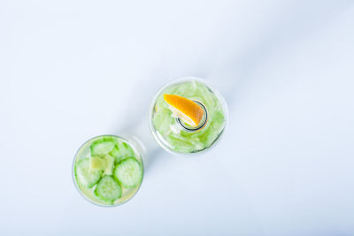 Close-up of fruits against white background