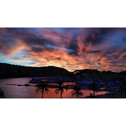 Scenic view of mountains against sky at sunset