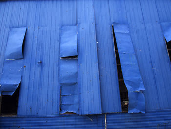 Close-up of blue wooden wall