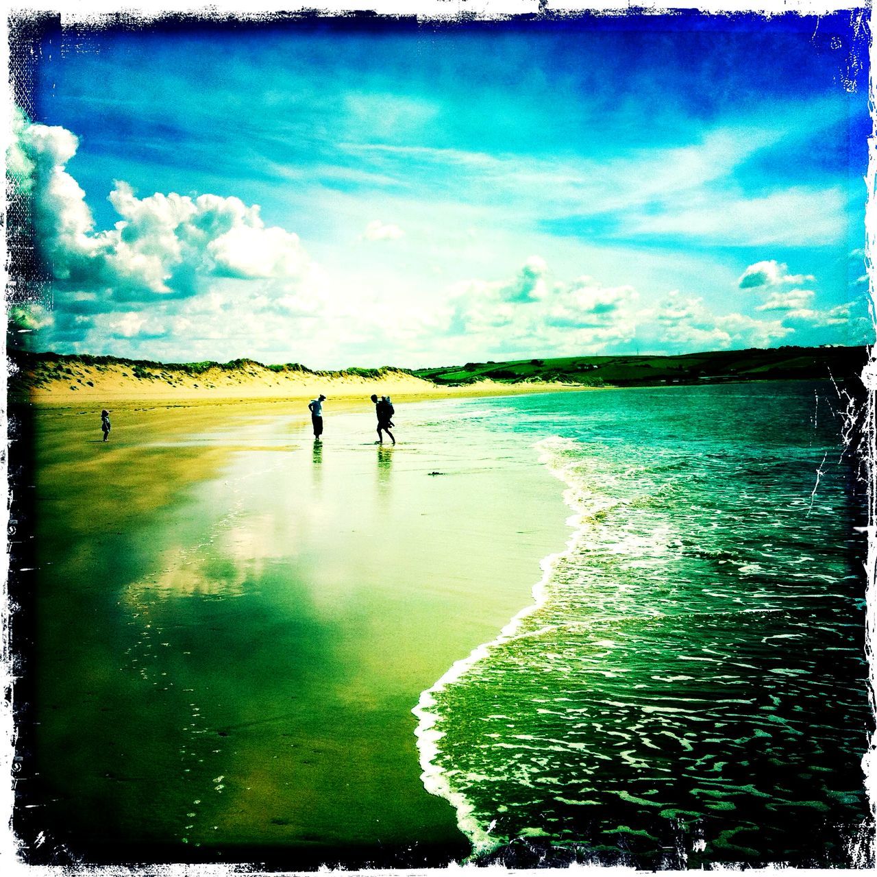 transfer print, auto post production filter, water, lifestyles, leisure activity, sky, men, sea, cloud - sky, nature, full length, tranquility, standing, beauty in nature, tranquil scene, boys, blue