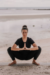 Yoga asanas on the background of dawn