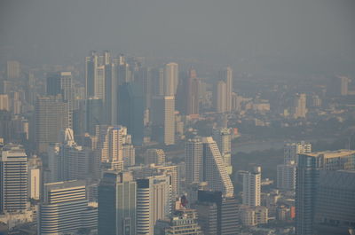 Modern buildings in city against sky