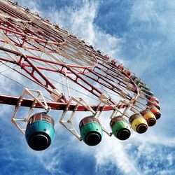 Low angle view of building against cloudy sky