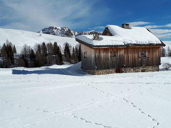 Scenic view of snow covered mountain against sky