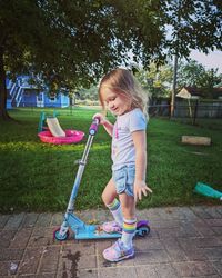 Full length of boy playing in park