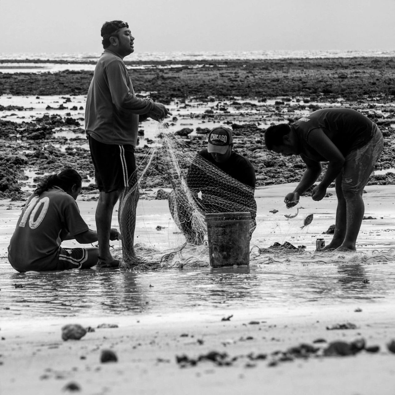 beach, water, sea, lifestyles, sand, leisure activity, full length, rear view, men, shore, casual clothing, walking, person, standing, boys, day, vacations