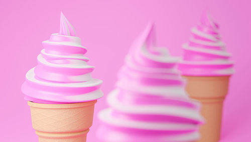 Close-up of ice cream against colored background