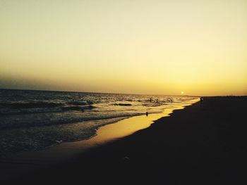 Scenic view of beach during sunset