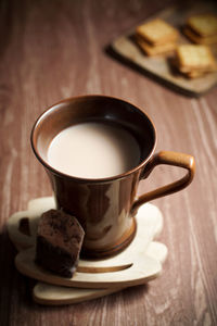 Close-up of coffee cup on table