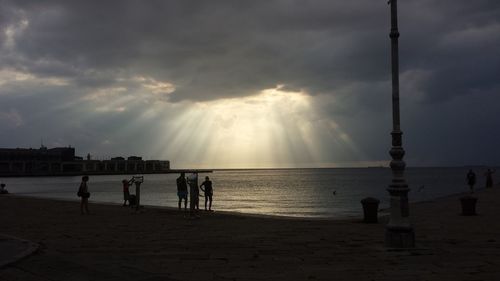 Tourists at sunset