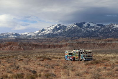 Tagged/abandoned camper posed on the north side of the henry mountains near robbers roost in utah